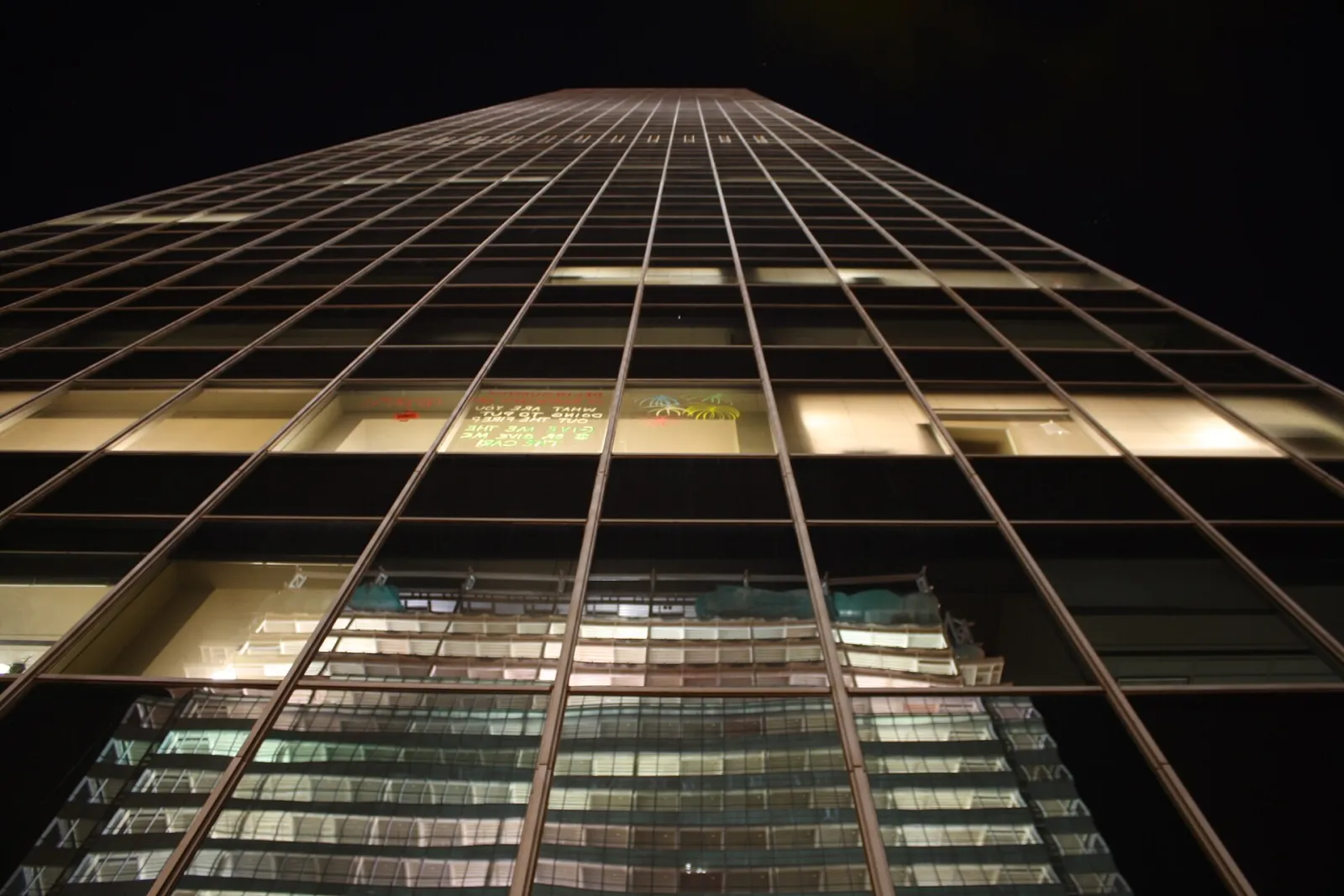 The glass curtain wall of Chase Tower, downtown Phoenix, looking up